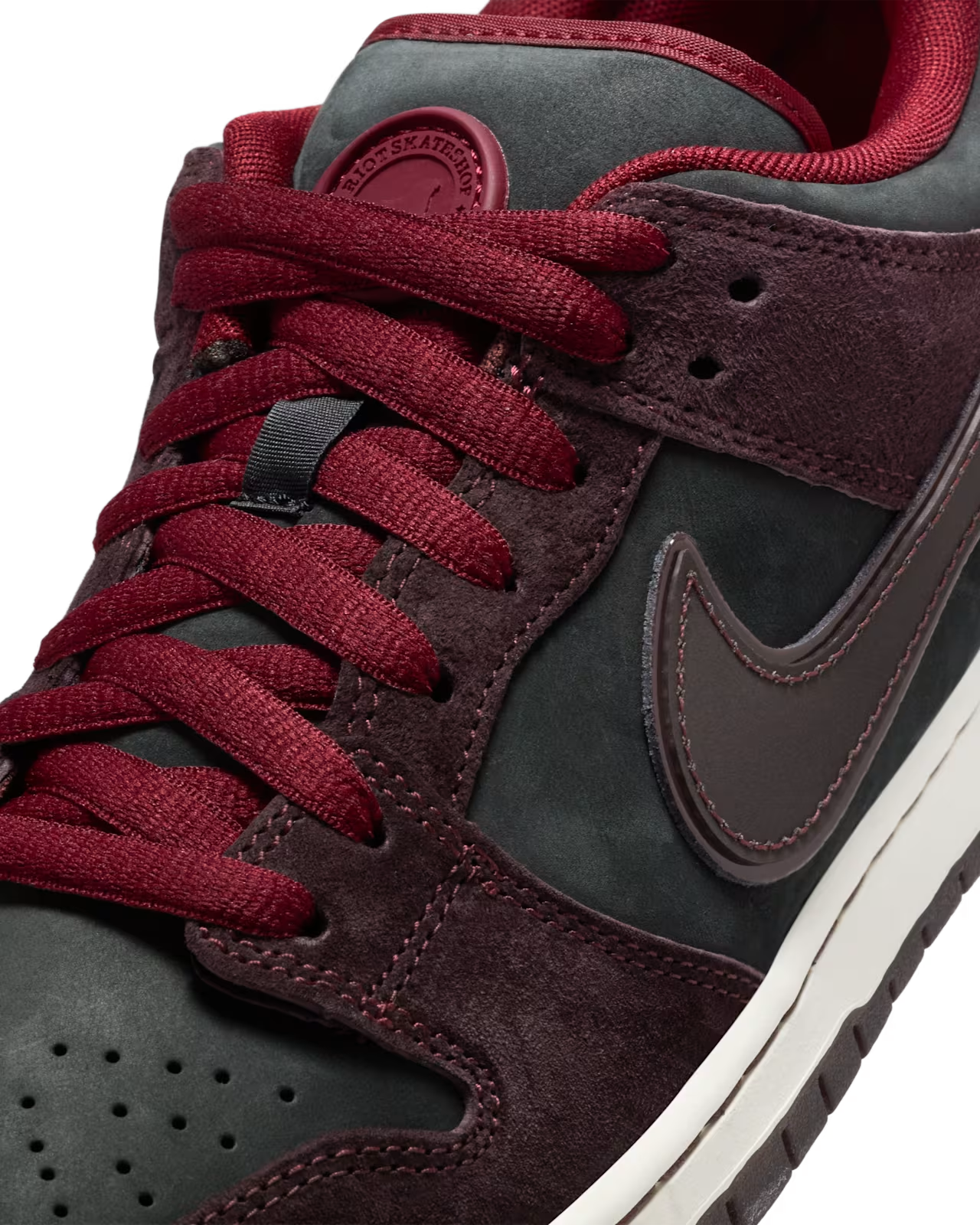 Nike SB Dunk Low Pro x Riot Skateshop Mahogany and Team Red
